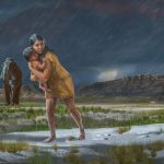 A prehistoric woman holds a child with mammoths in the background